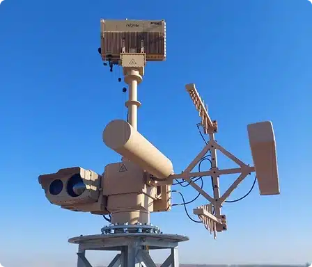 Counter-UAS detection system featuring multi-band antennas and sensor modules mounted on mast